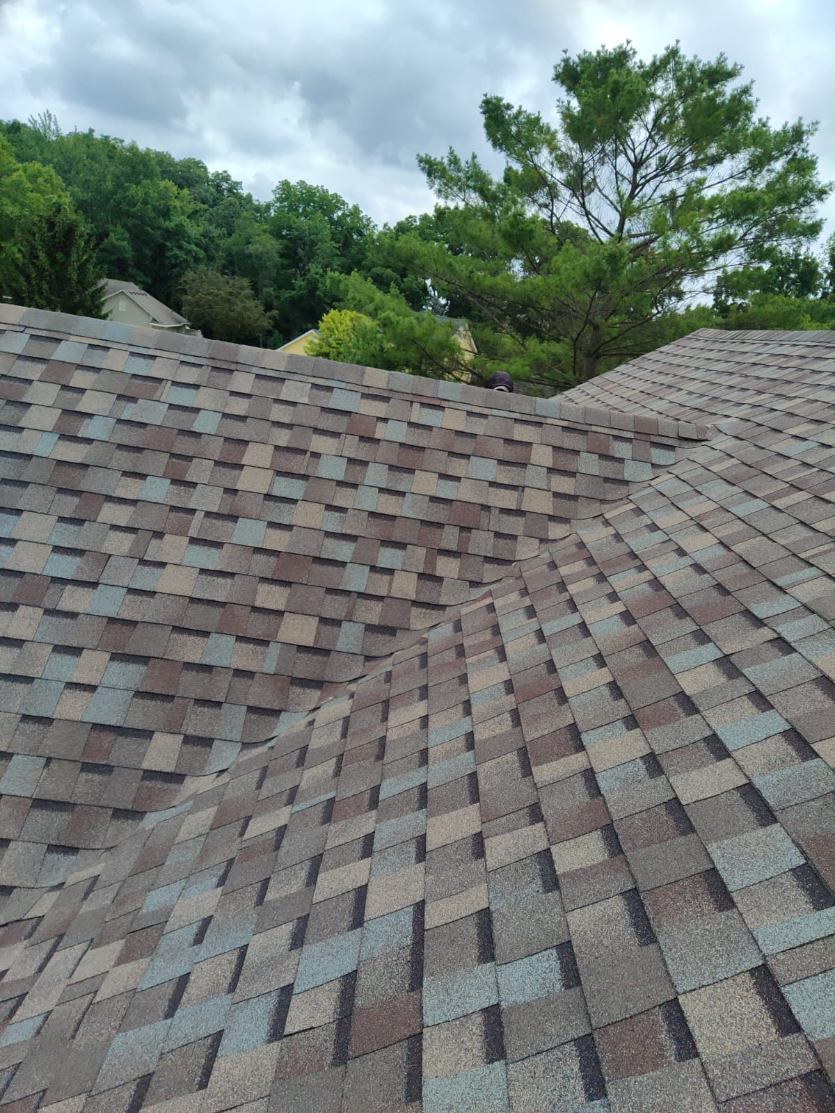 Colorful Atlas Pinnacle shingles on a new roof.