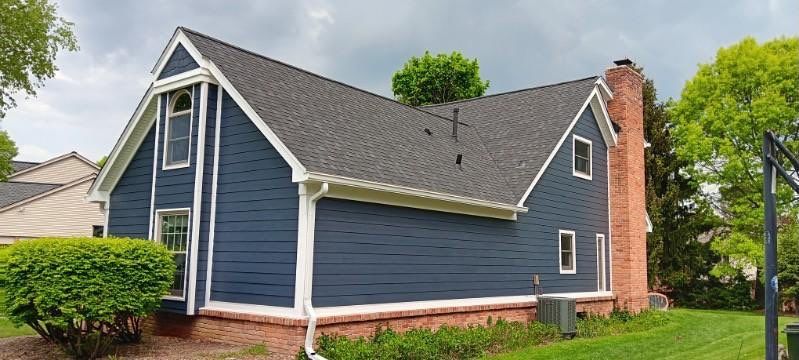 Martino Rochester HIlls 2 back view of home in Rochester Hills with new gutters
